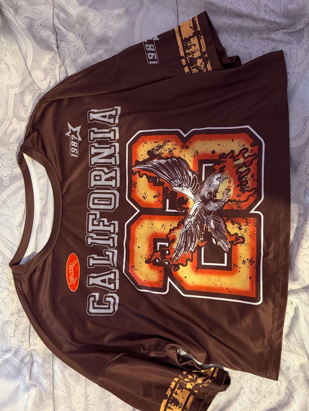 SHEIN Brown Jersey Top with Orange Graphic